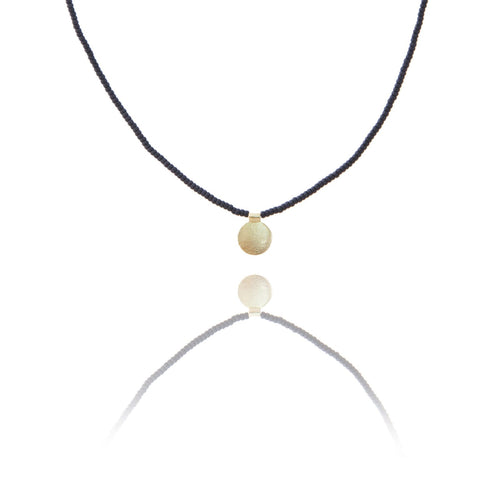 The Makery <br> Short beaded necklace with brushed brass disc <br> BLACK